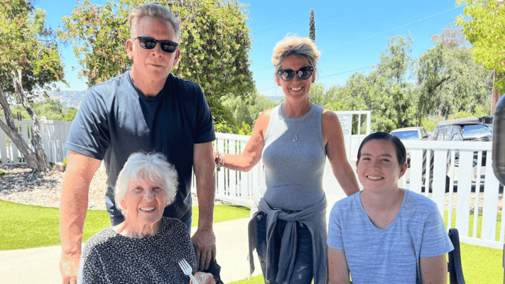 Residents and staff enjoying time outdoors together