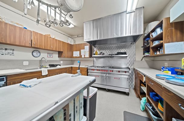 Commercial kitchen with stainless steel appliances