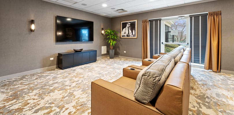 Cozy common area with comfortable furniture and TV