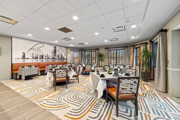 Dining room with tables set for a meal service