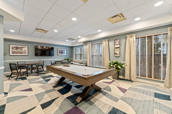 Interior view of a game room with pool table