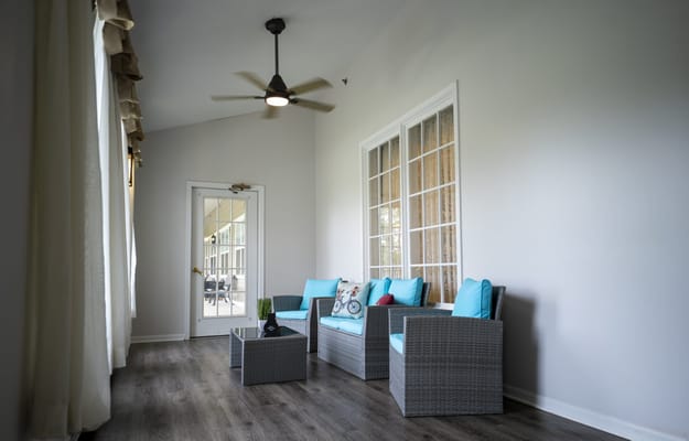 Bright and airy sunroom with modern furniture