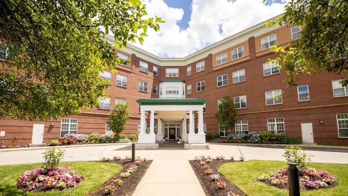 Front entrance of Wingate Residences with landscaping