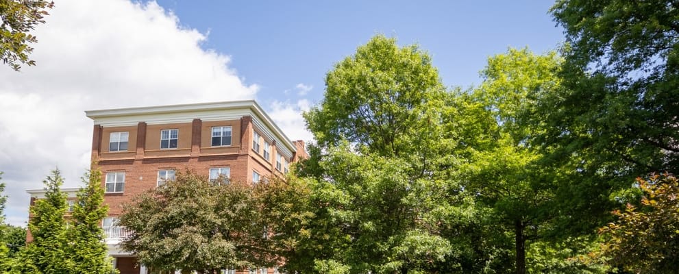Exterior view of Wingate Residences with trees