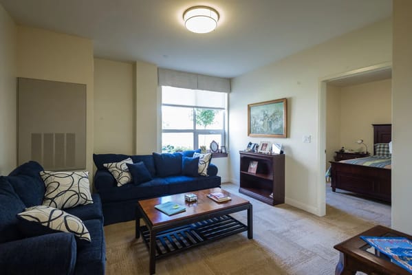 Cozy living area in a senior resident's room