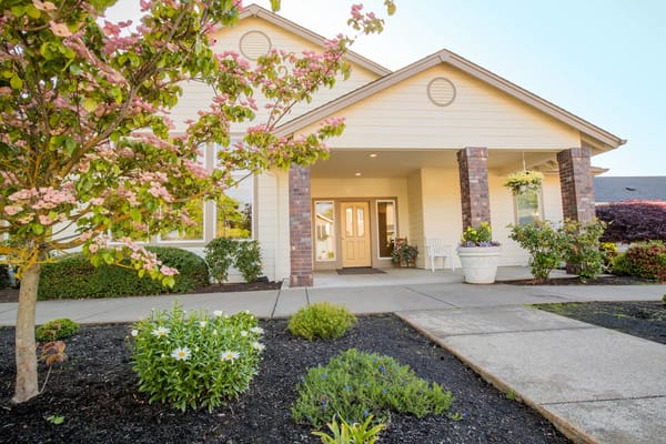 Entrance of Gateway Gardens with blooming flowers