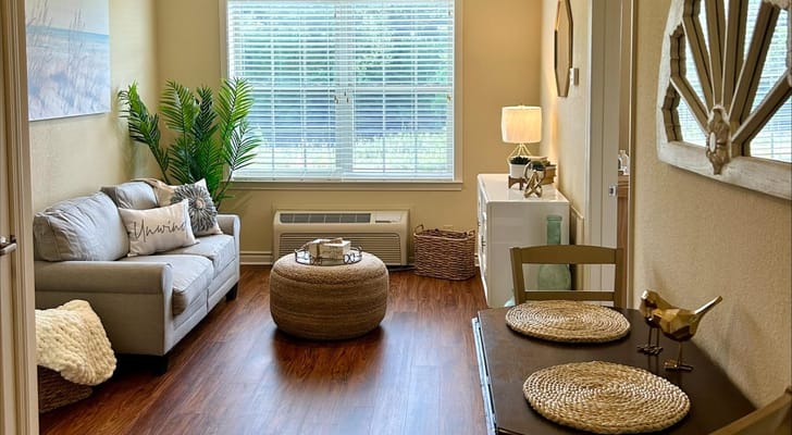 Cozy and inviting common area with natural light