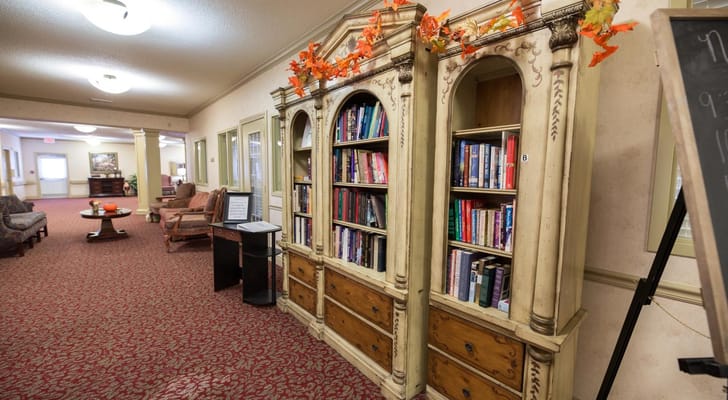 Interior view of a cozy common area with bookshelves