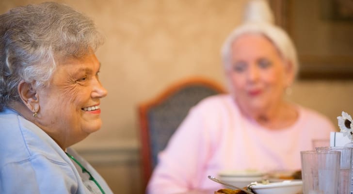 Two female residents having a conversation