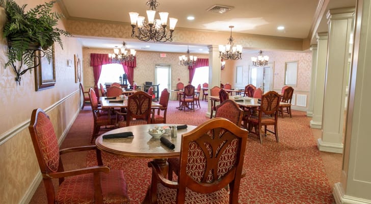 Dining area with decorative tables and chairs