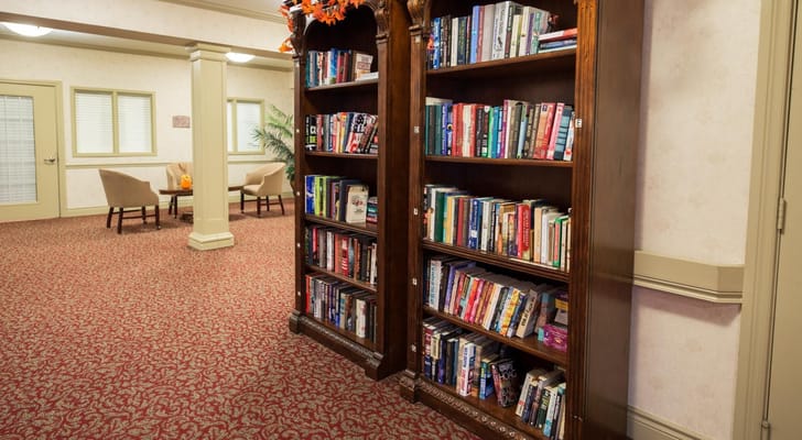 Interior view of a cozy library area with bookshelves