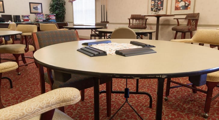 Common area with tables and chairs set up