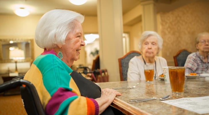 Residents enjoying beverages in a dining area
