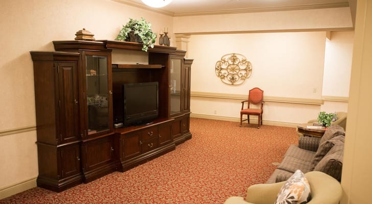 Cozy common area with seating and a television