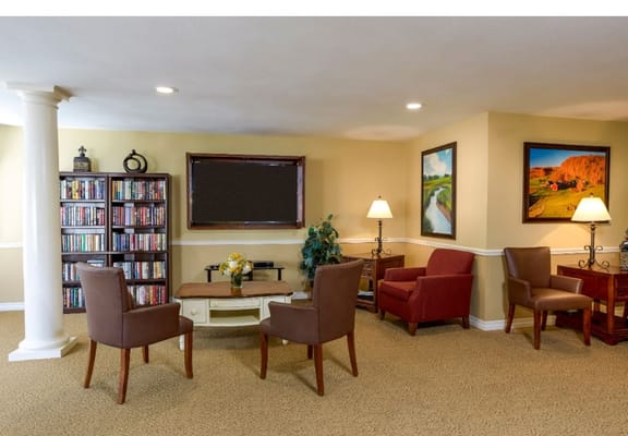 Inviting lounge with chairs and a bookshelf