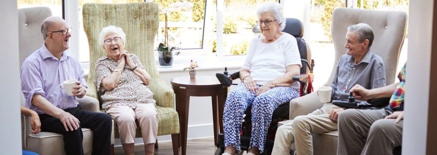 Residents enjoying conversation in a common area
