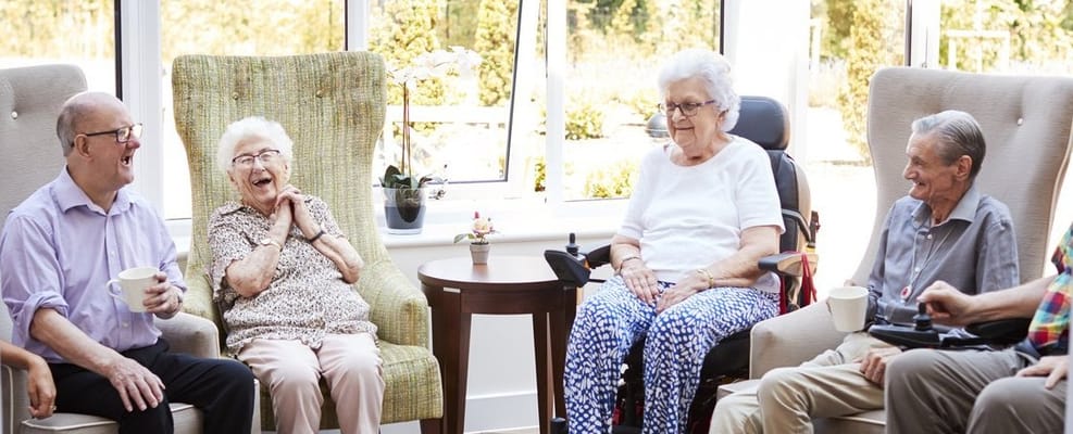 Residents enjoying conversation in a common area