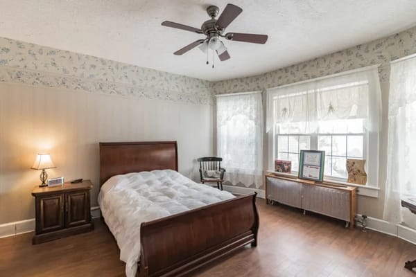 Cozy bedroom with natural light and simple decor