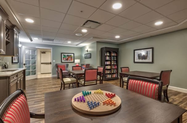Activity room with game tables and seating