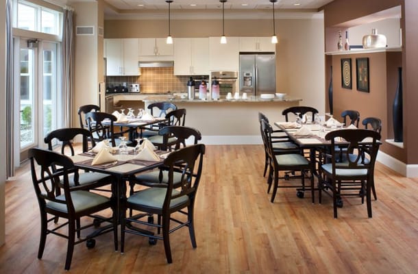 Dining area with elegantly set tables and modern decor