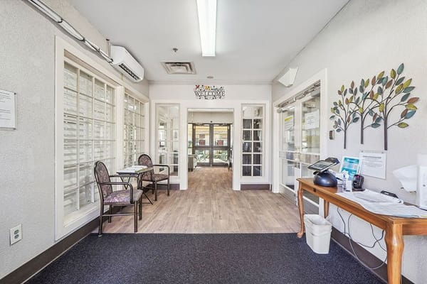 Welcoming reception area with seating and decor