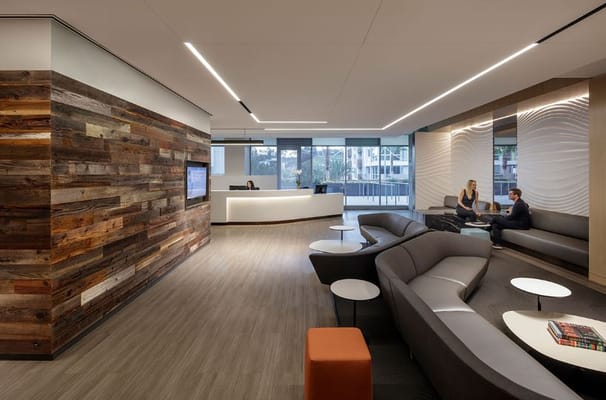 Modern lobby with seating area and reception desk