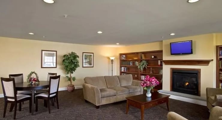 Spacious living room with seating and a fireplace