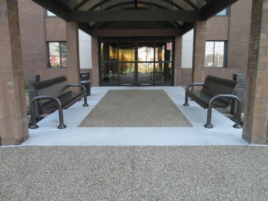 Covered entrance with seating and walkways