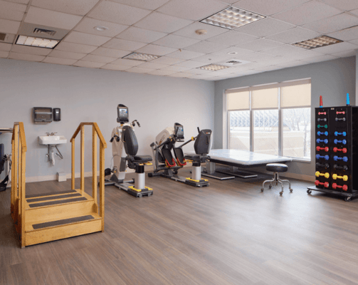 Interior view of a rehabilitation gym with equipment