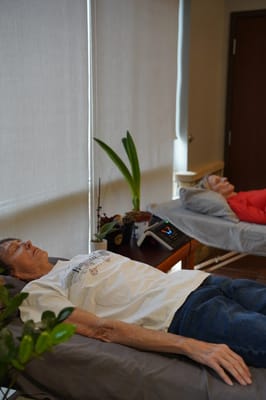 Residents resting in a serene indoor setting
