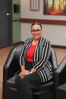 Staff member in a bright common area