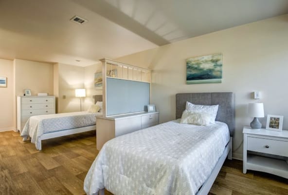 Cozy shared bedroom in a senior living facility