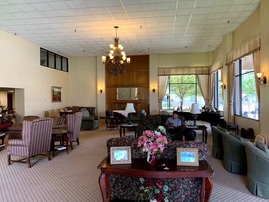 Common area with seating and residents