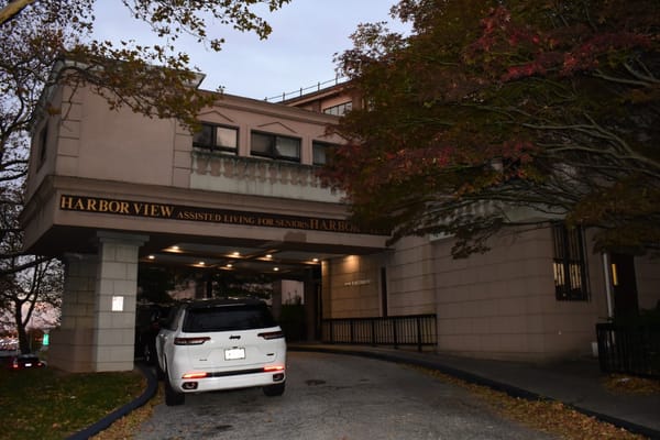 Entrance of Harbor View assisted living facility at dusk