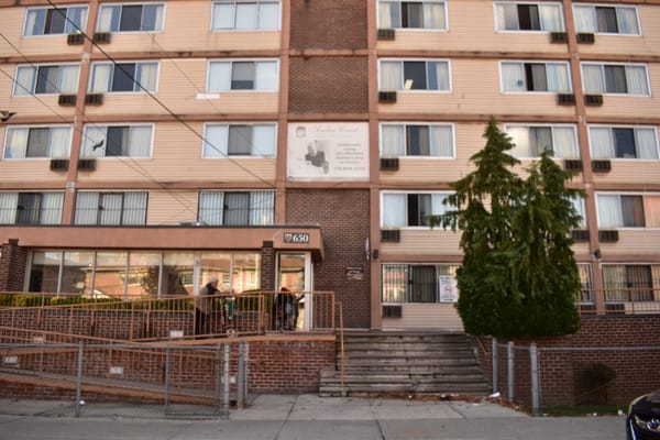 Front entrance of Amber Court of Brooklyn with residents