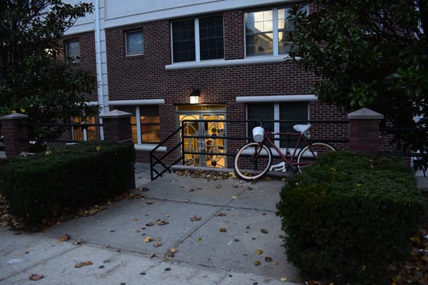Exterior view of the facility entrance with landscaping