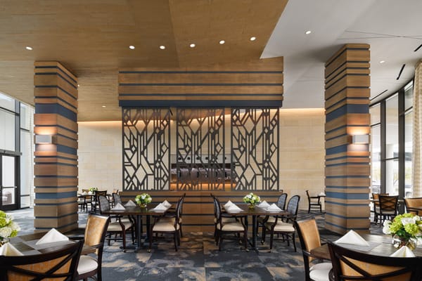 Modern dining area with elegant decor and seating