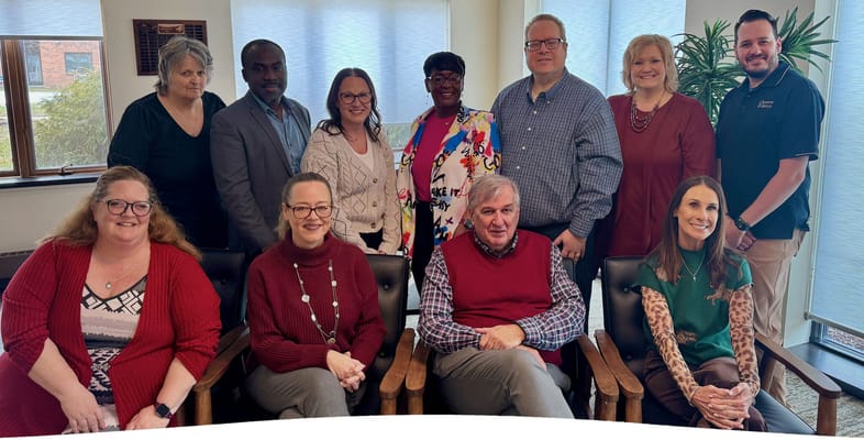 Staff group photo in a common area