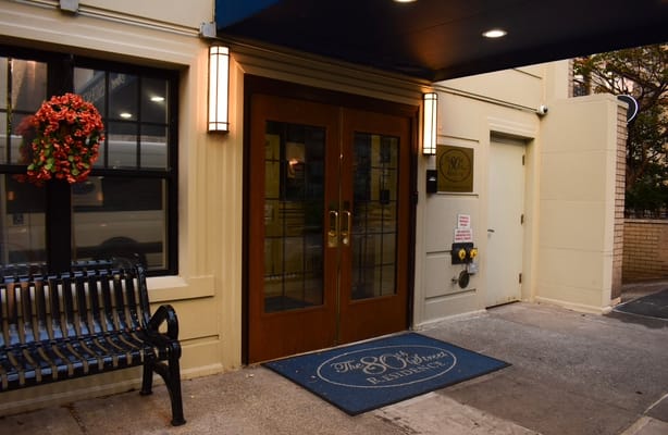 Entrance of the 80th Street Residence with flowers