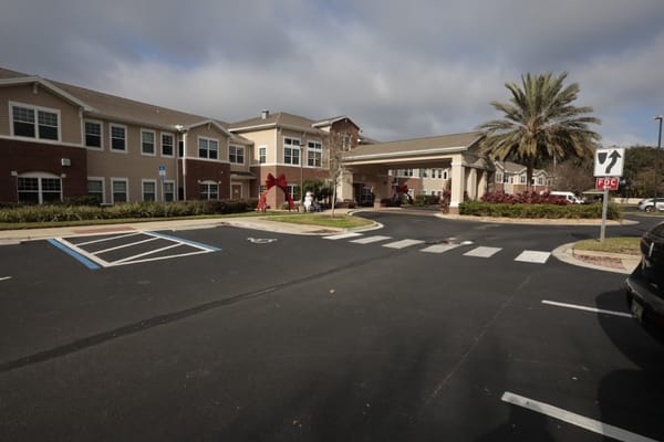 Exterior view of a senior living facility entrance