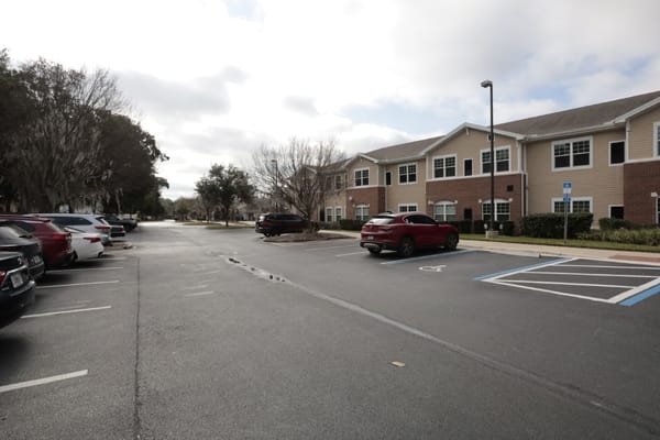 Exterior view of the facility with parking area