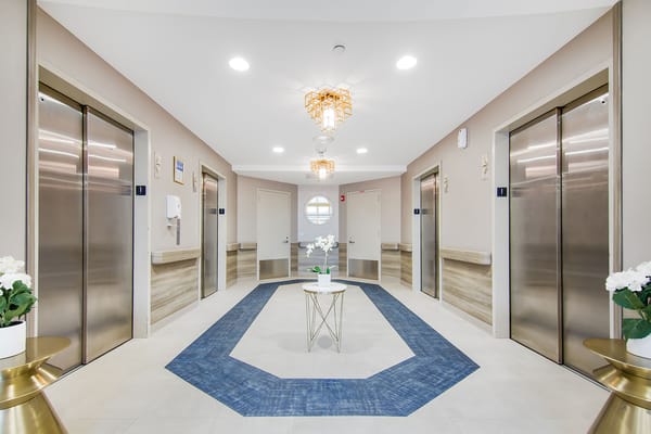 Interior view of a facility lobby with elevators