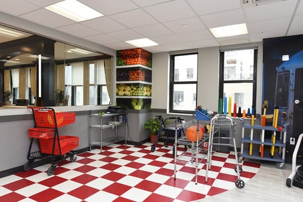 Activity room with equipment and colorful decor