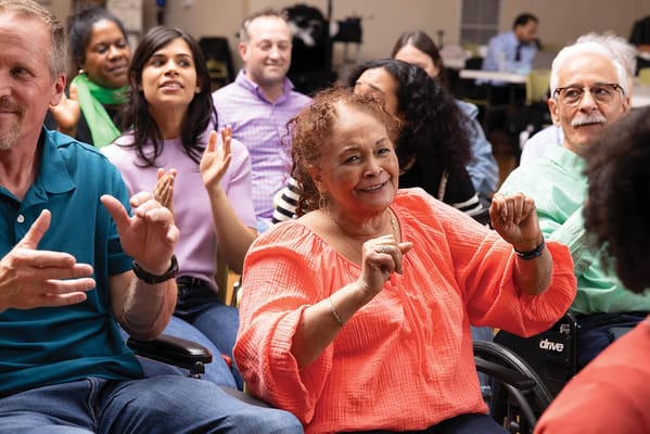 Residents enjoying an engaging activity in a common area