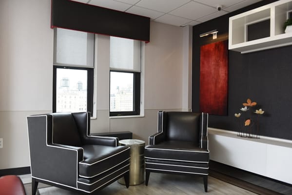 Interior of a common area with two chairs