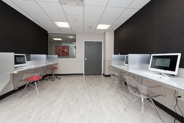 Bright and modern computer room with desks