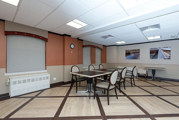 Interior common area with tables and chairs
