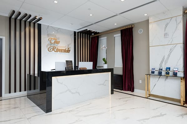 Reception area with modern decor and marble flooring