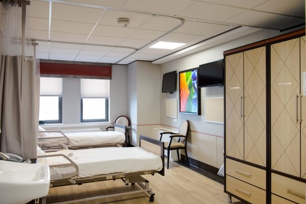 Clean and modern resident room with two beds