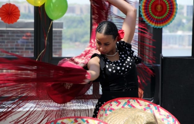 Resident performing a dance in a common area